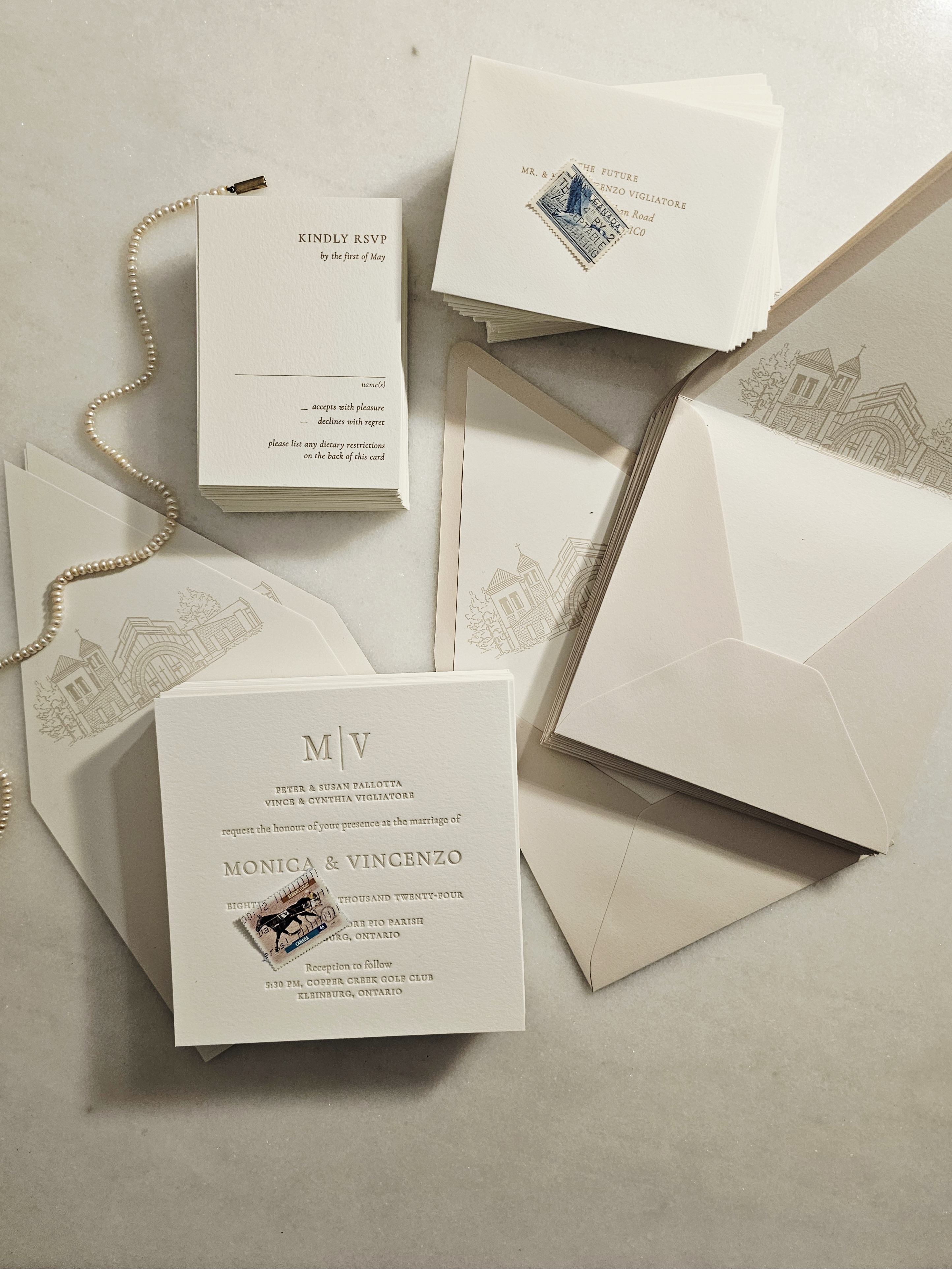 Letterpress M|V monogram suite with venue illustration and addressed envelopes