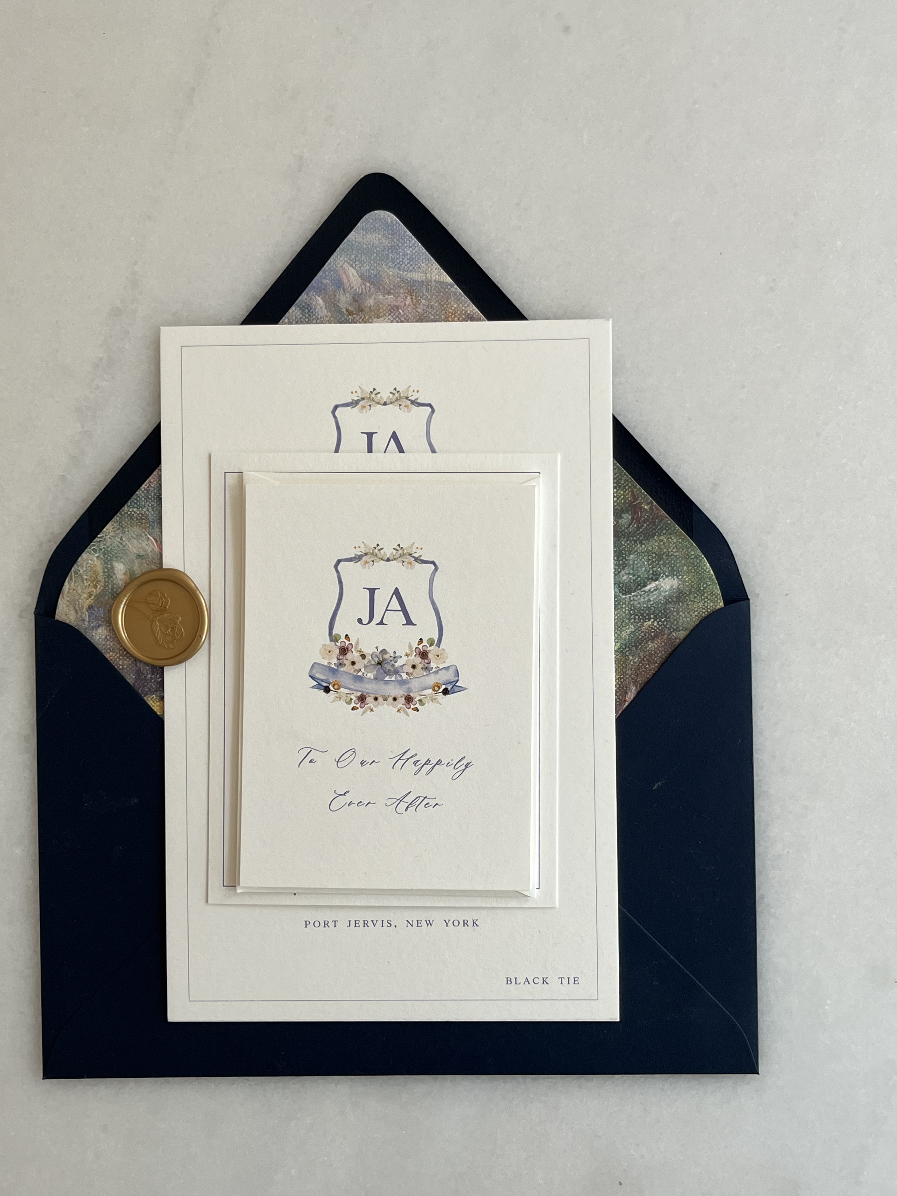 Navy heraldic crest monogram wedding invitation suite with gold wax seal